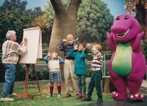 Rolf "paedo" Harris pops by to sketch Barney and his child cult whilst in the process of praising the dark lord Satan. 